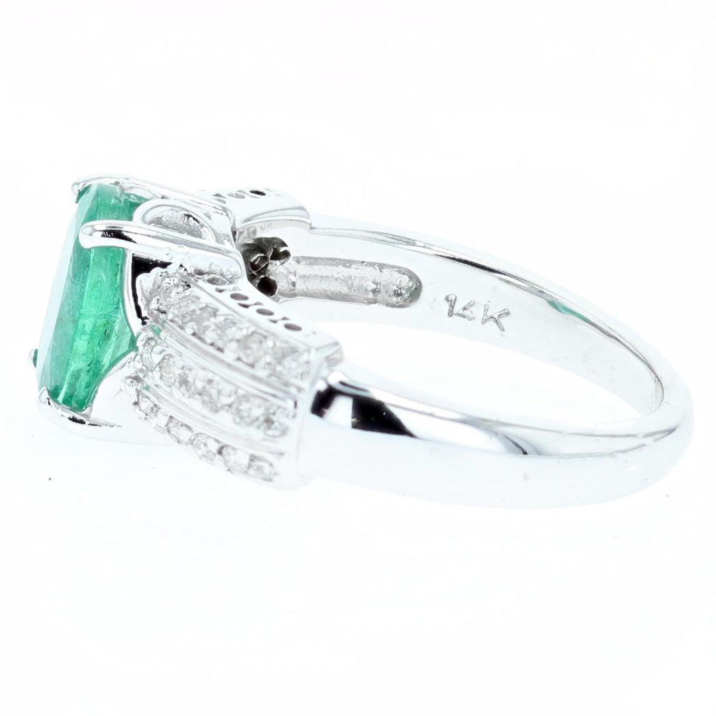 1.63ct oval cut emerald and diamond ring