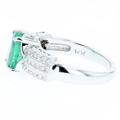 1.63ct oval cut emerald and diamond ring