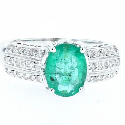 1.63ct oval cut emerald and diamond ring